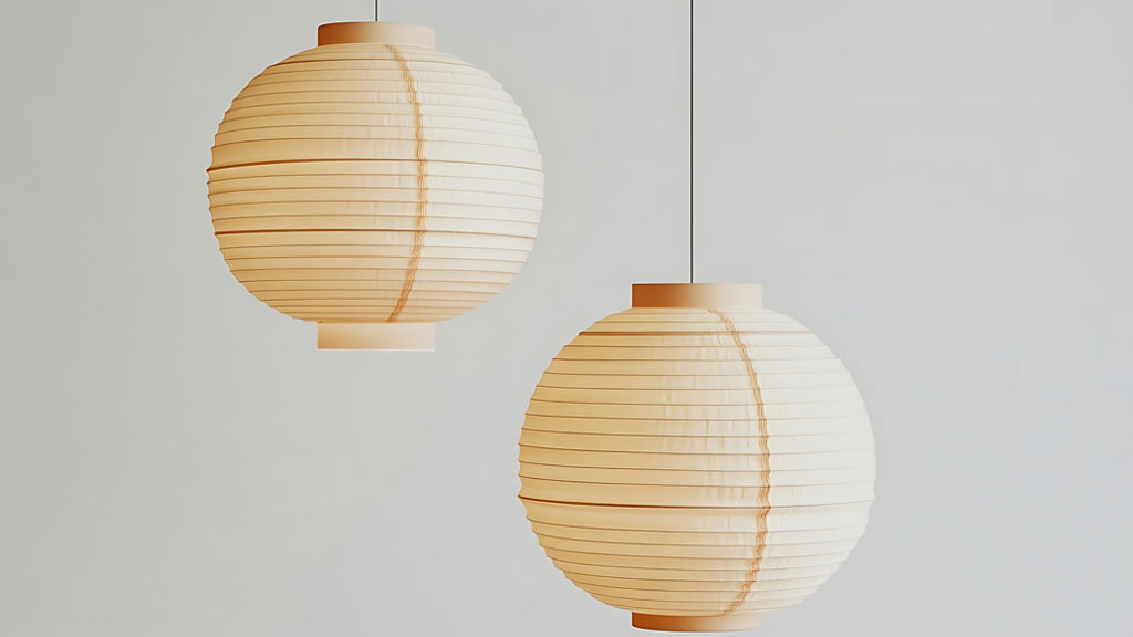 Personne observant suspension japonaise dans salon lumineux évaluant proportions visuellement